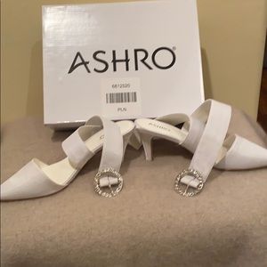 Ladies white strap pumps